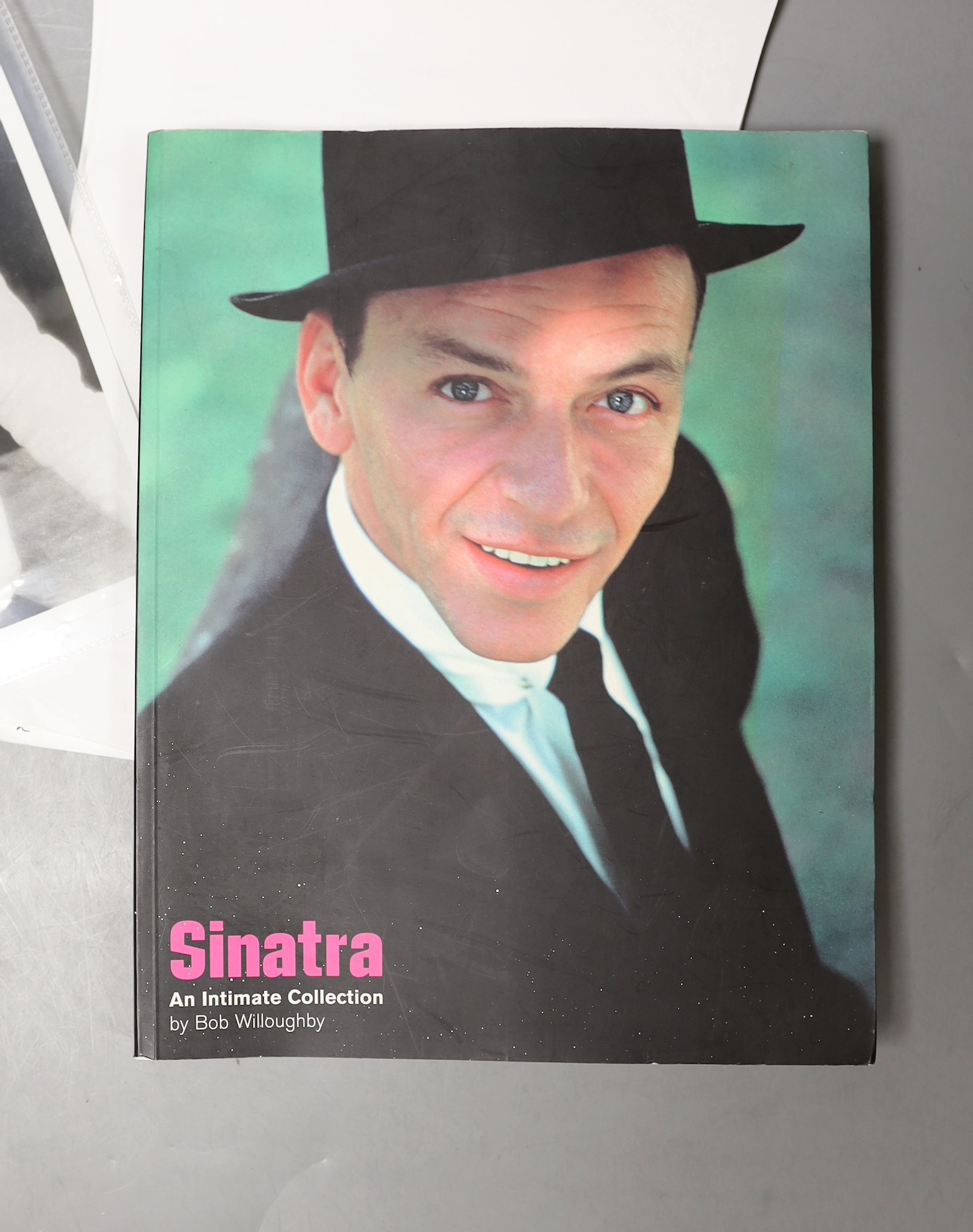 A photo of Sinatra, signed by him, along with a book on him and a copy of his will.